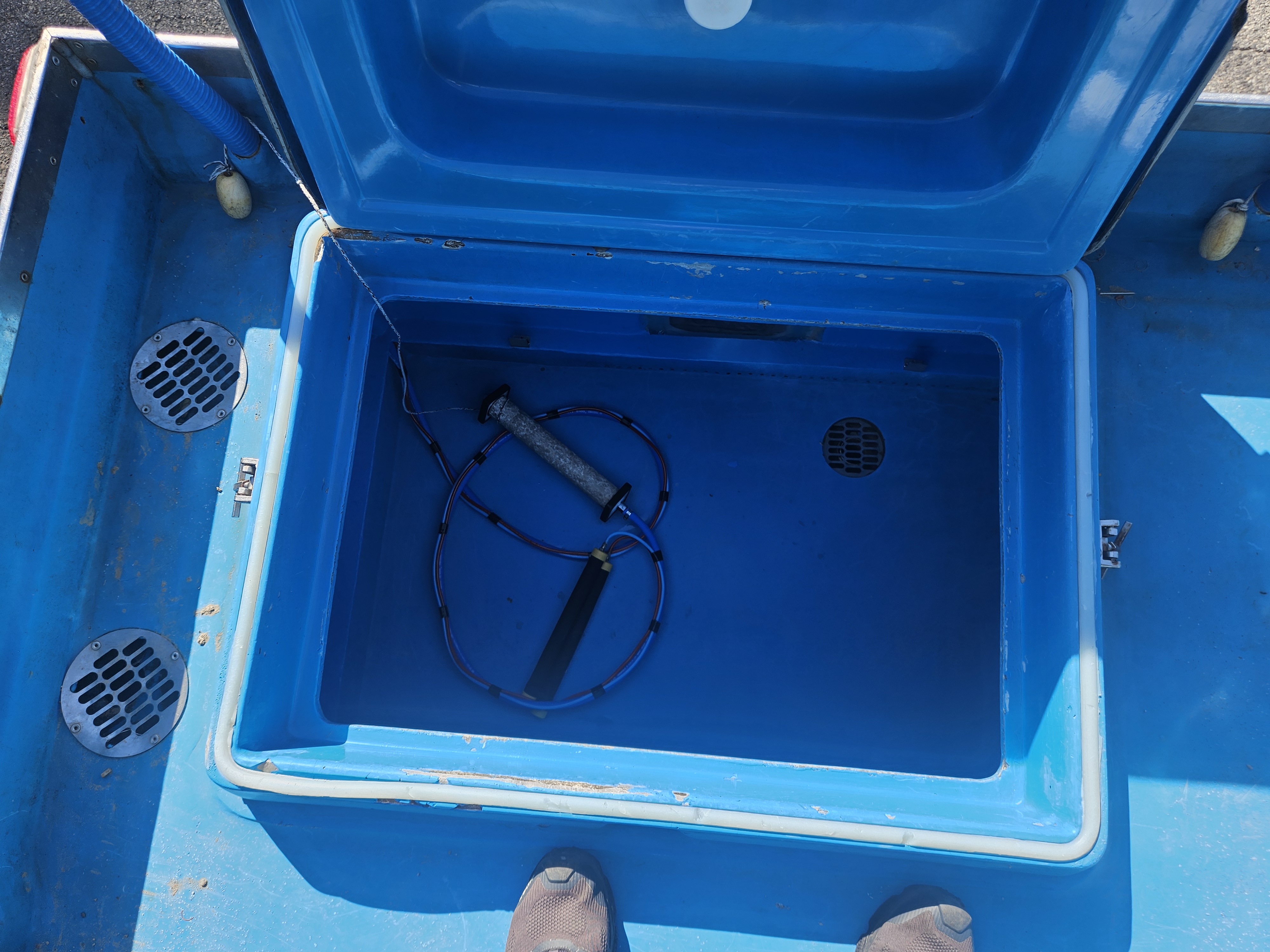 Close-up of tank deck with oxygen diffuser hoses and access panels