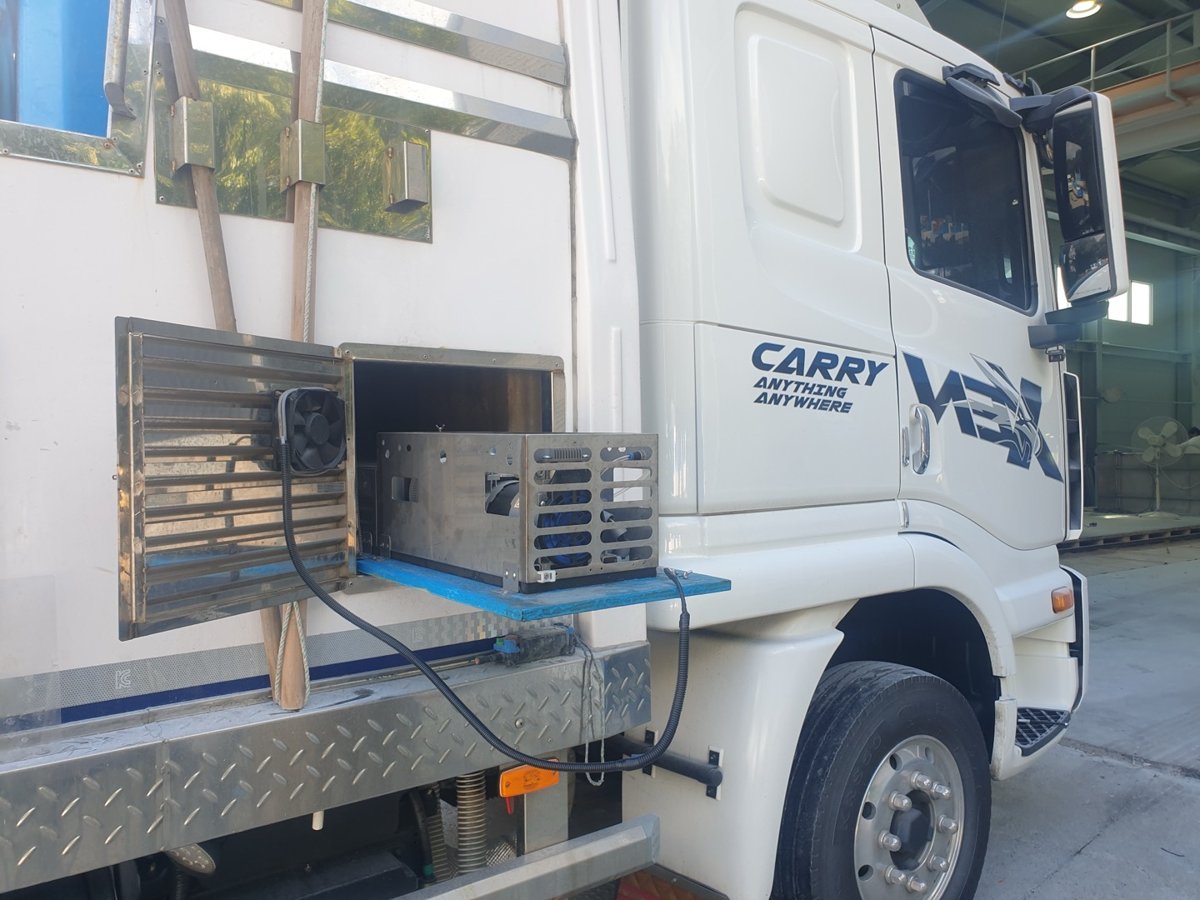 O2MOS PSA oxygen generator mounted in the side compartment of a live fish transport truck